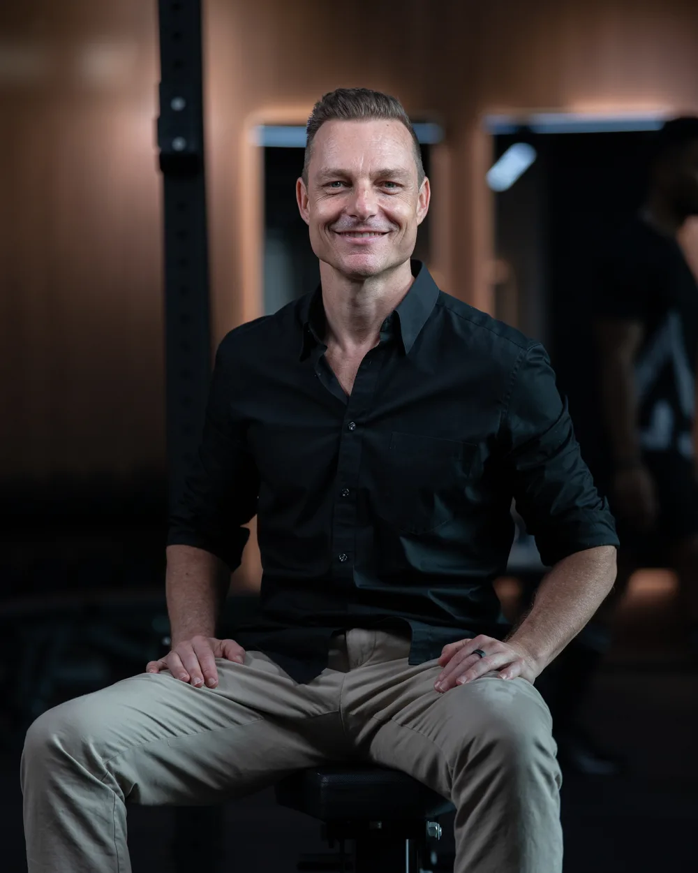 Dan Remon, seated in his Bangkok training studio